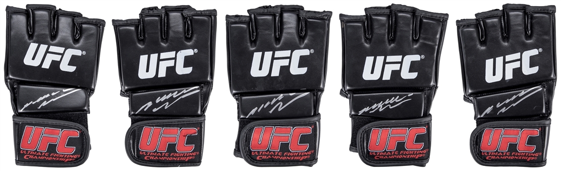 Lot of (5) Anderson Silva Signed UFC Grappling Gloves (PSA/DNA)